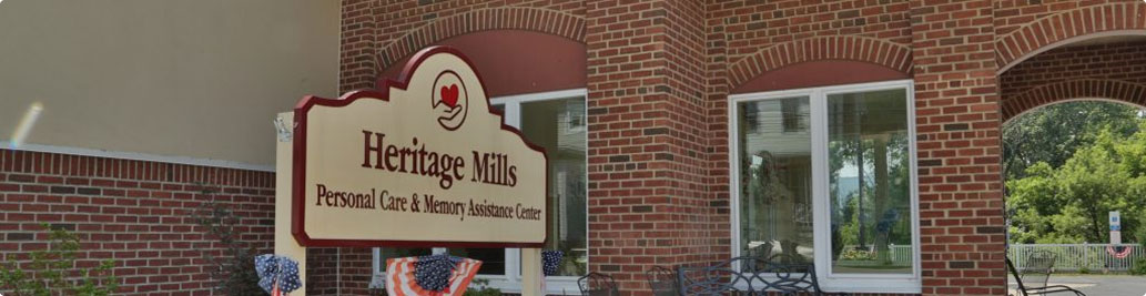 A closeup exterior view of the Heritage Mills Memory Care & Personal Care facility.